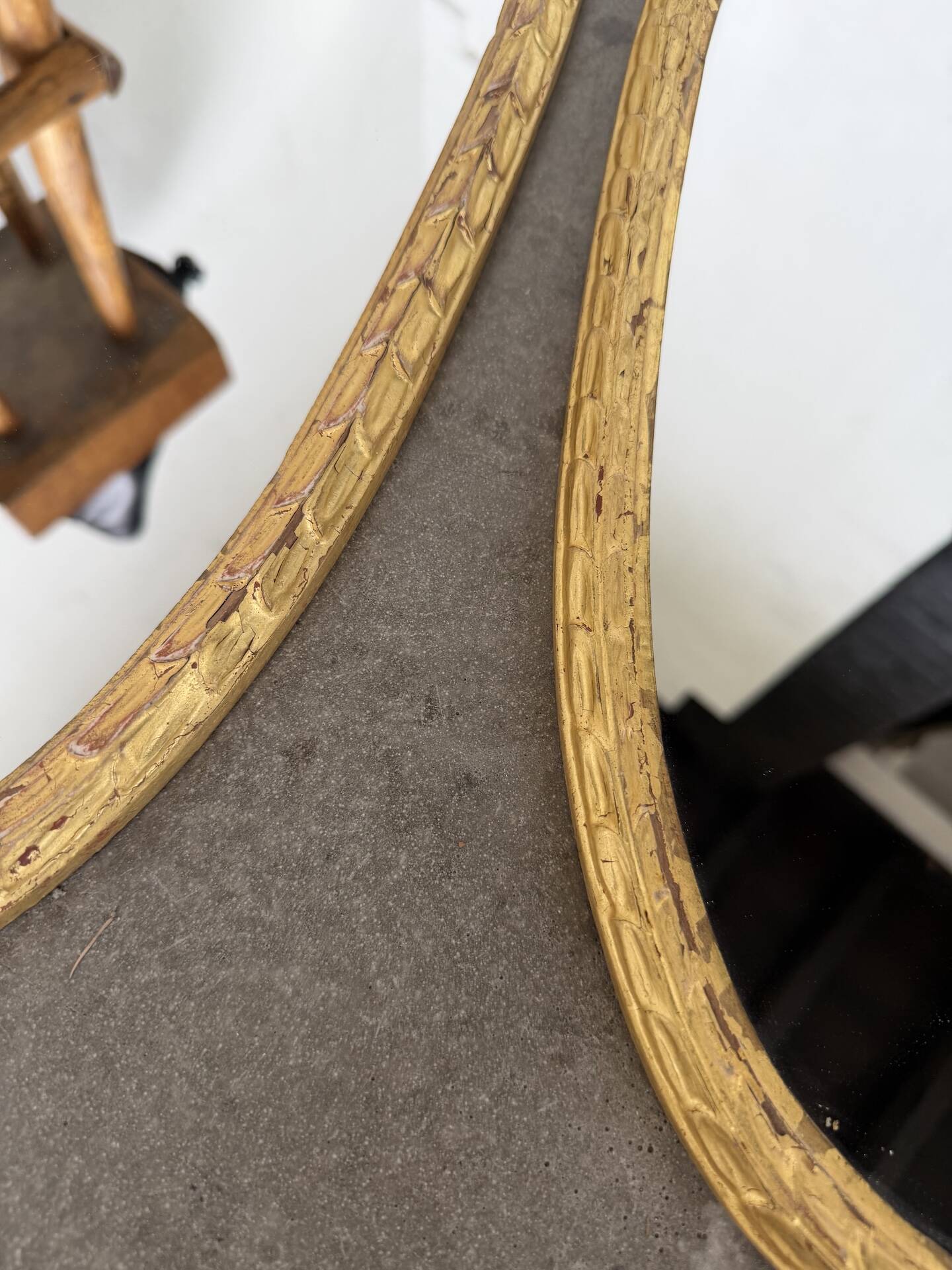 Pair of oval mirrors 1900 gilded stucco