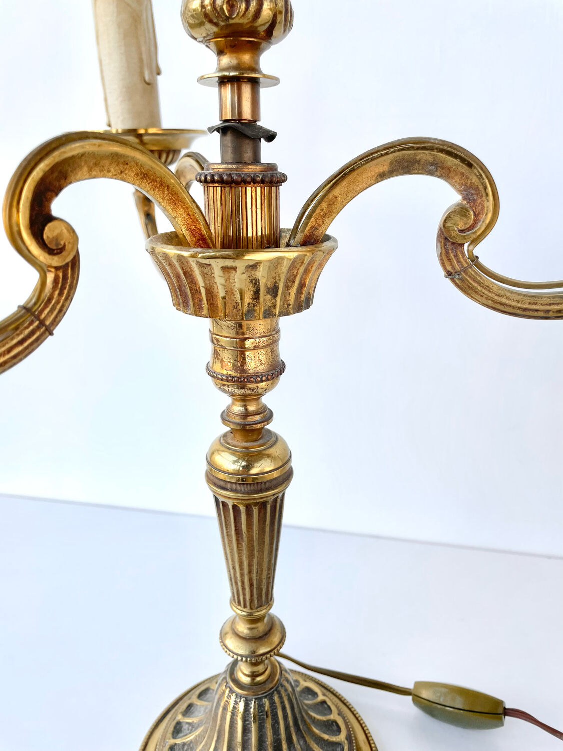 Three-branched golden candlestick
