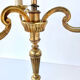 Three-branched golden candlestick