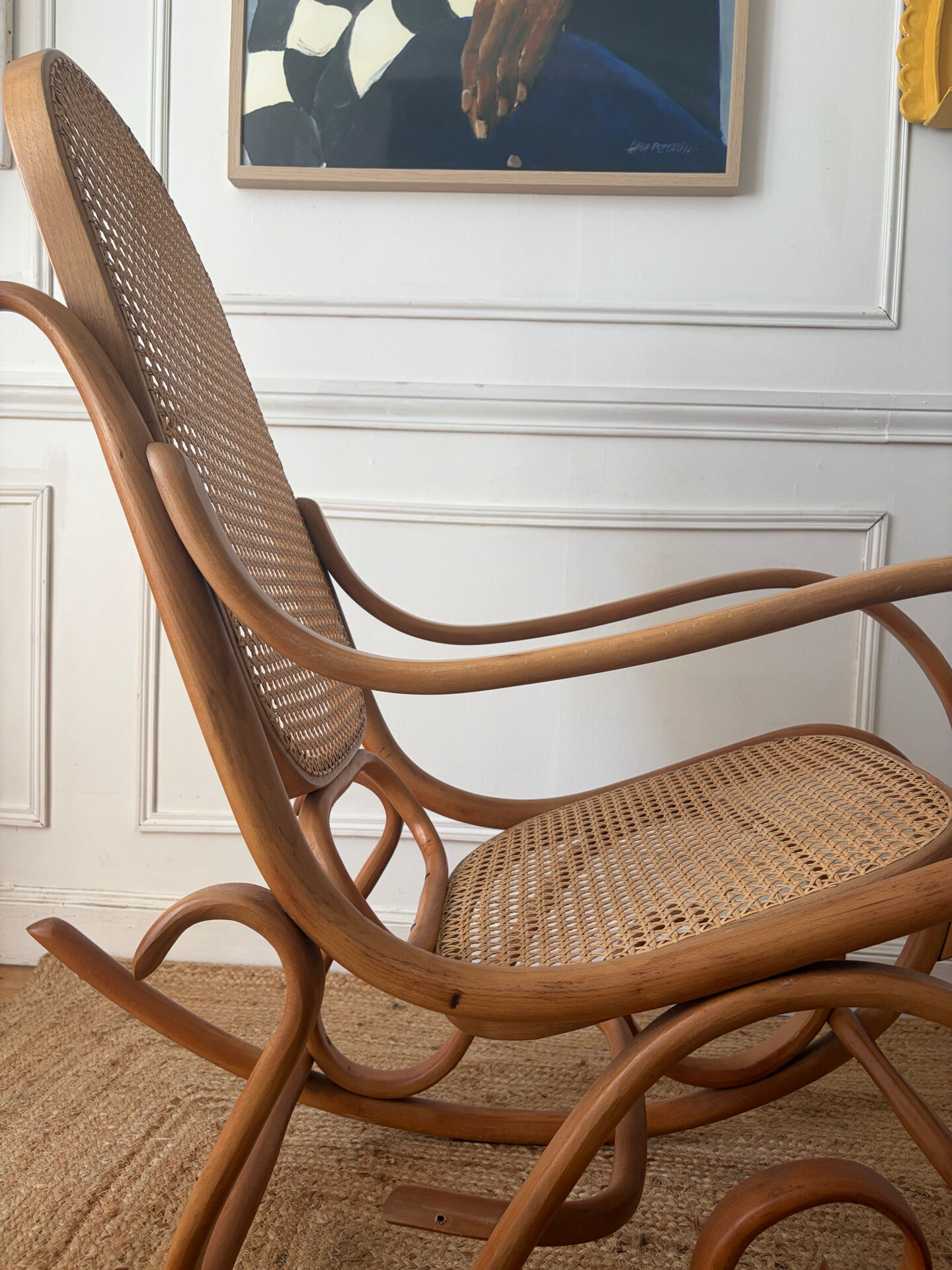 Curved wooden rocking chair