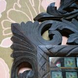 Carved mirror