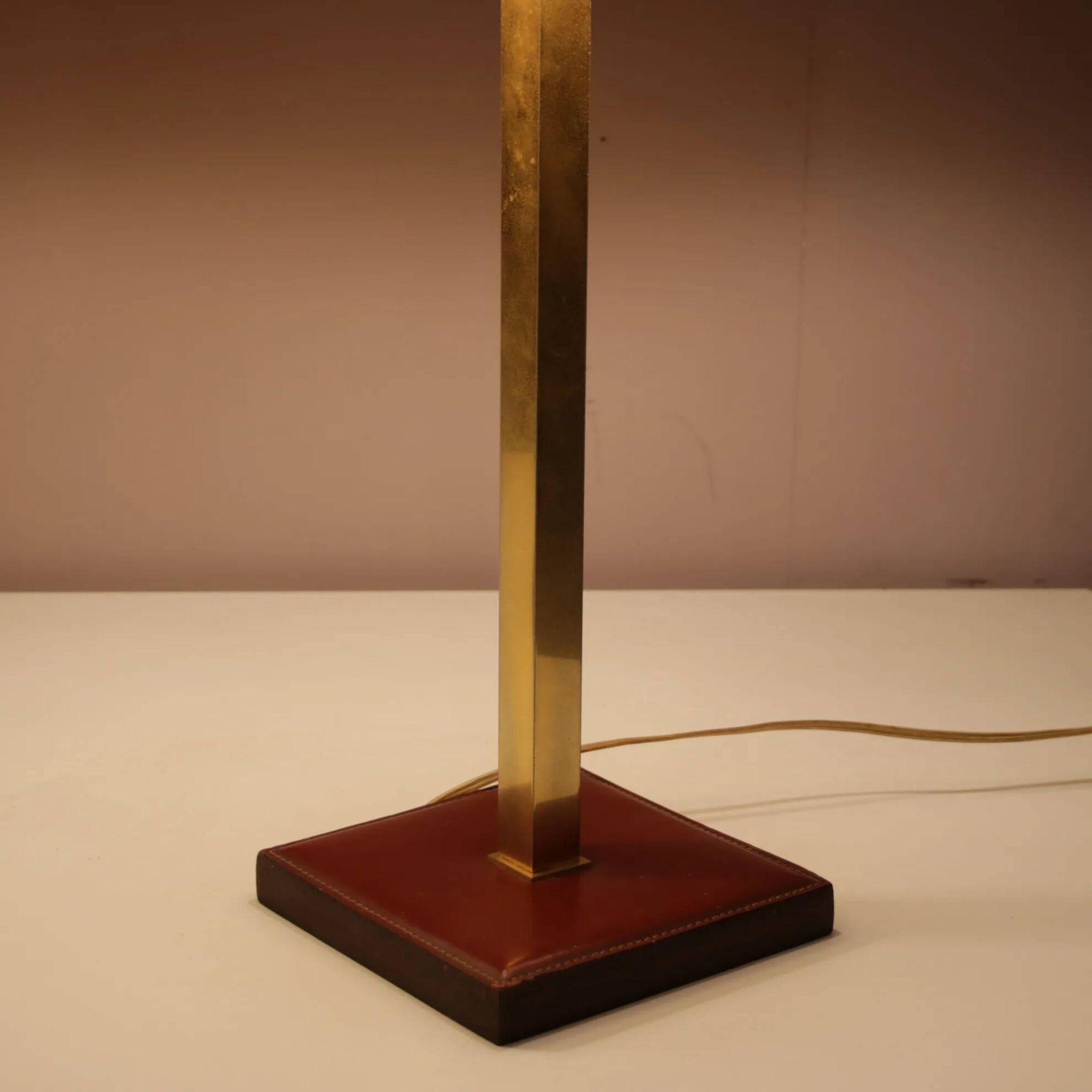 Pair of leather and brass table lamps from the 1960s, originating from Belgium.