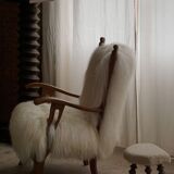 Pair of Scandinavian armchairs in oak and long-haired Icelandic sheepskin by Henning Kjærnulf, 1950.