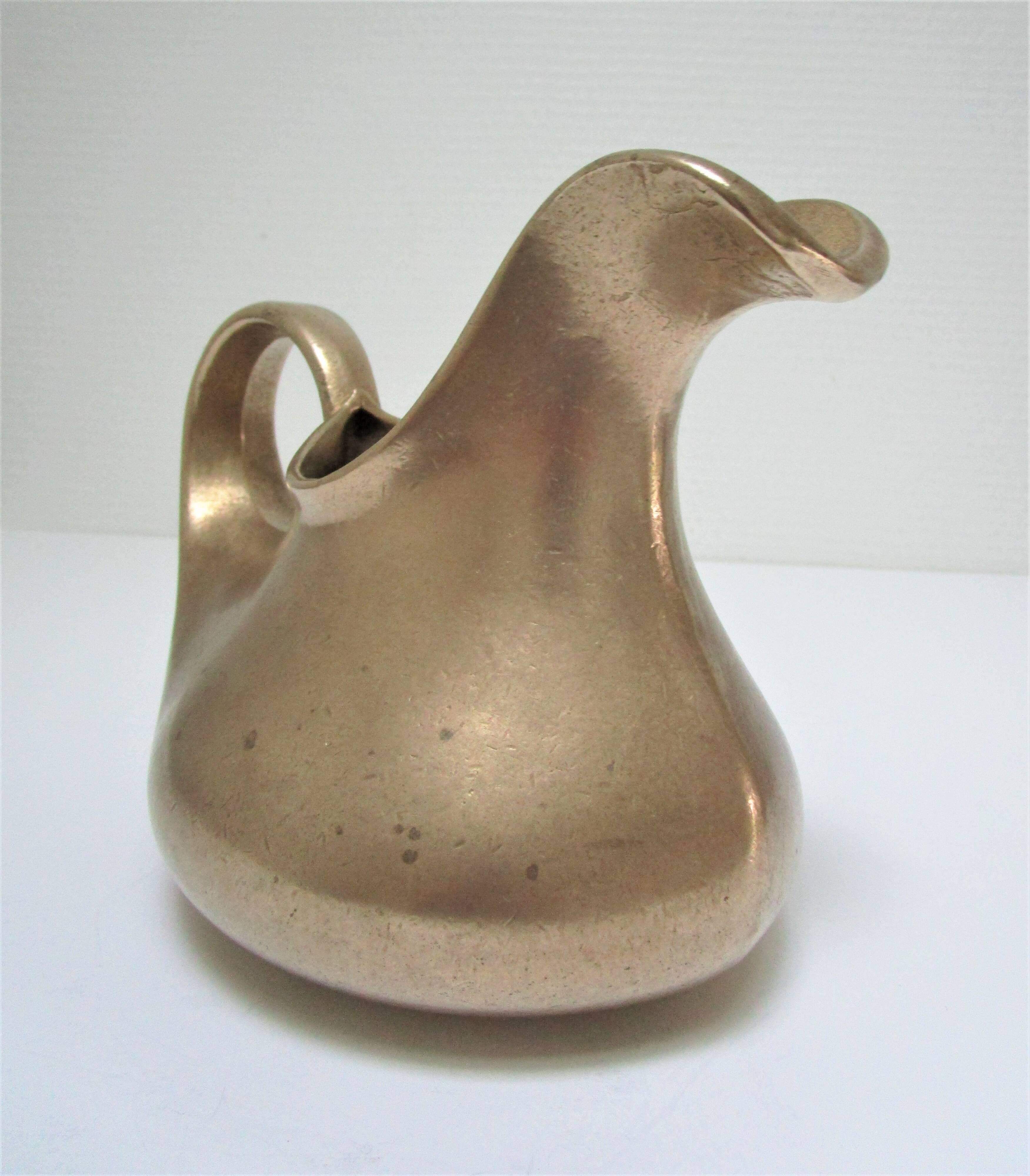 Stylized sculptural solid brass vase with handle