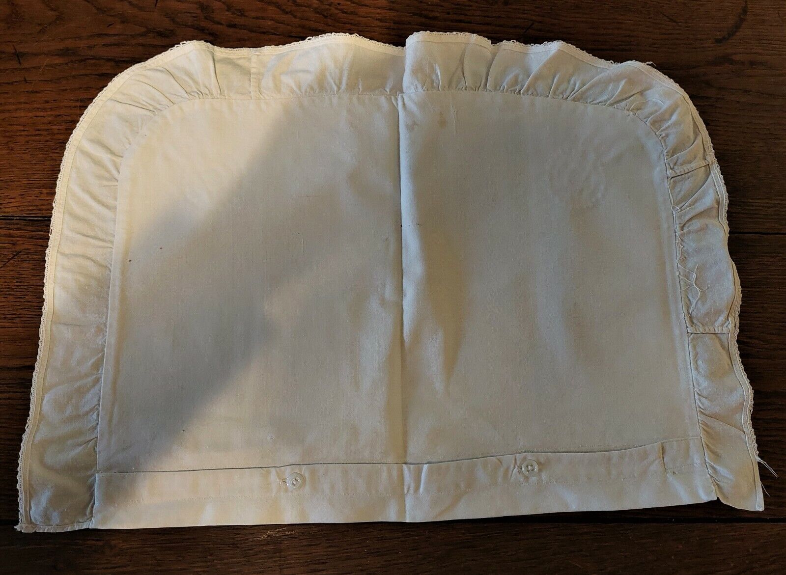 White cotton cushion or pillow case embroidered monogram and ruffle