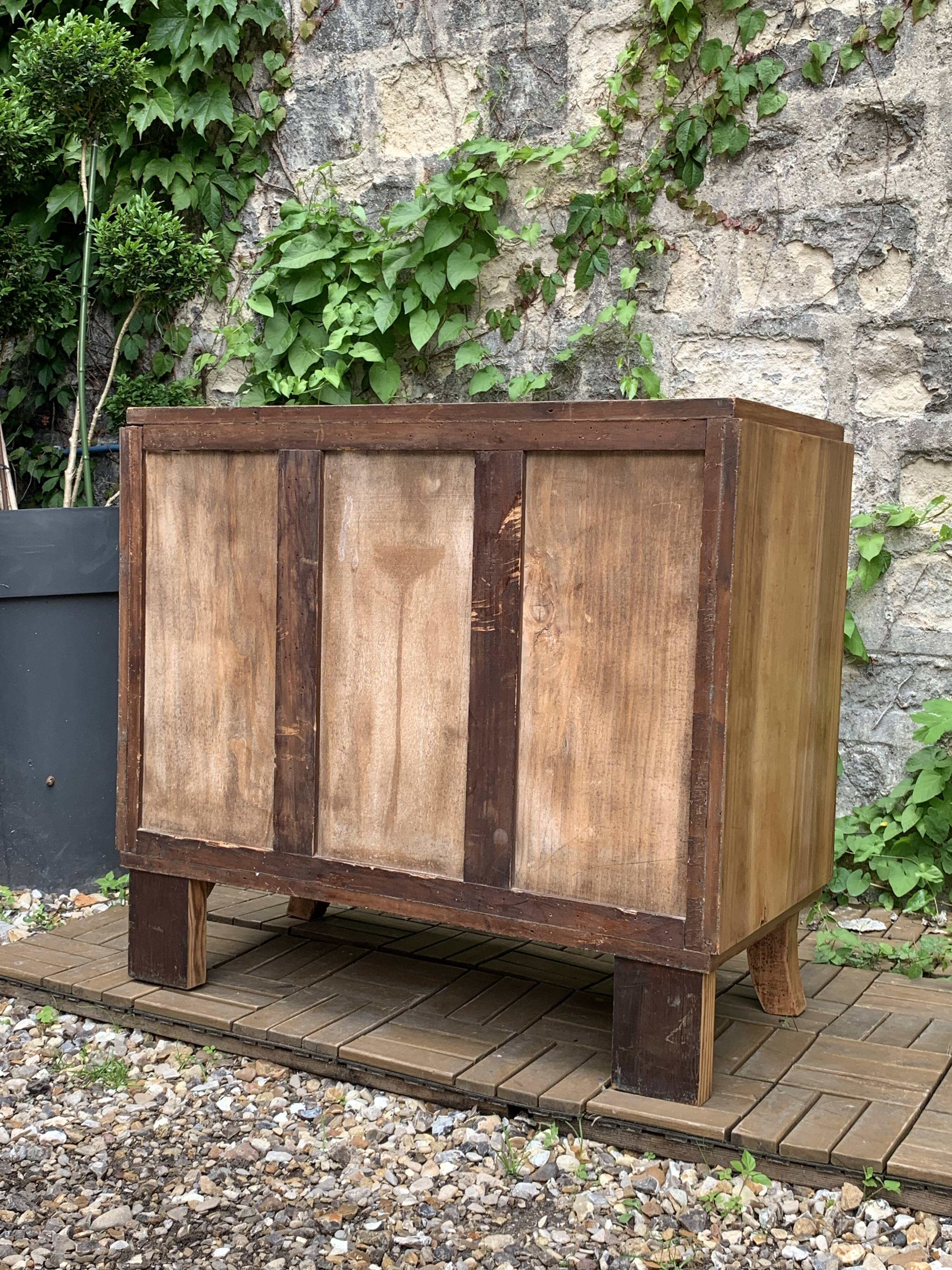 Art Deco chest of drawers in raw walnut burl