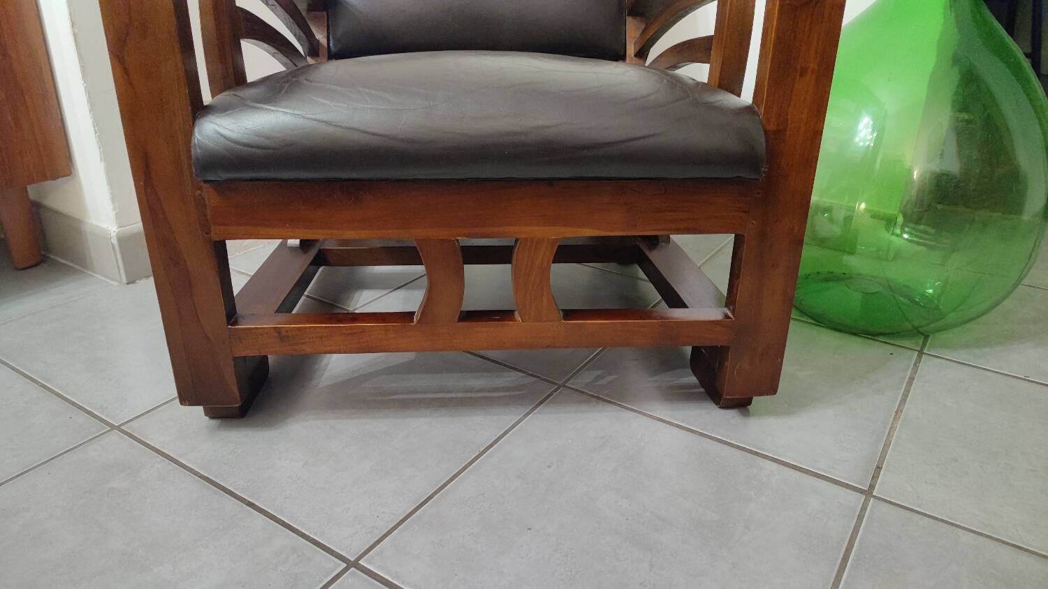 Leather and teak armchair