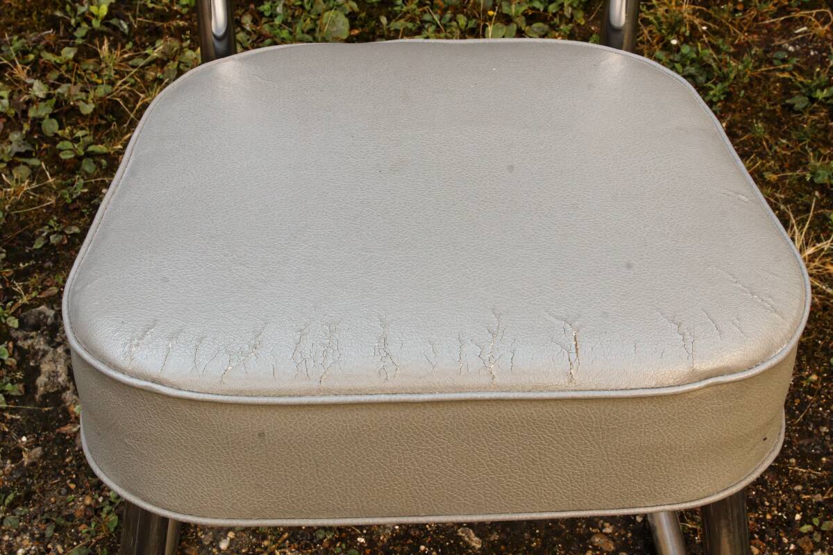 Set of 2 chairs and 1 armchair from the 70s in chrome metal and faux leather.