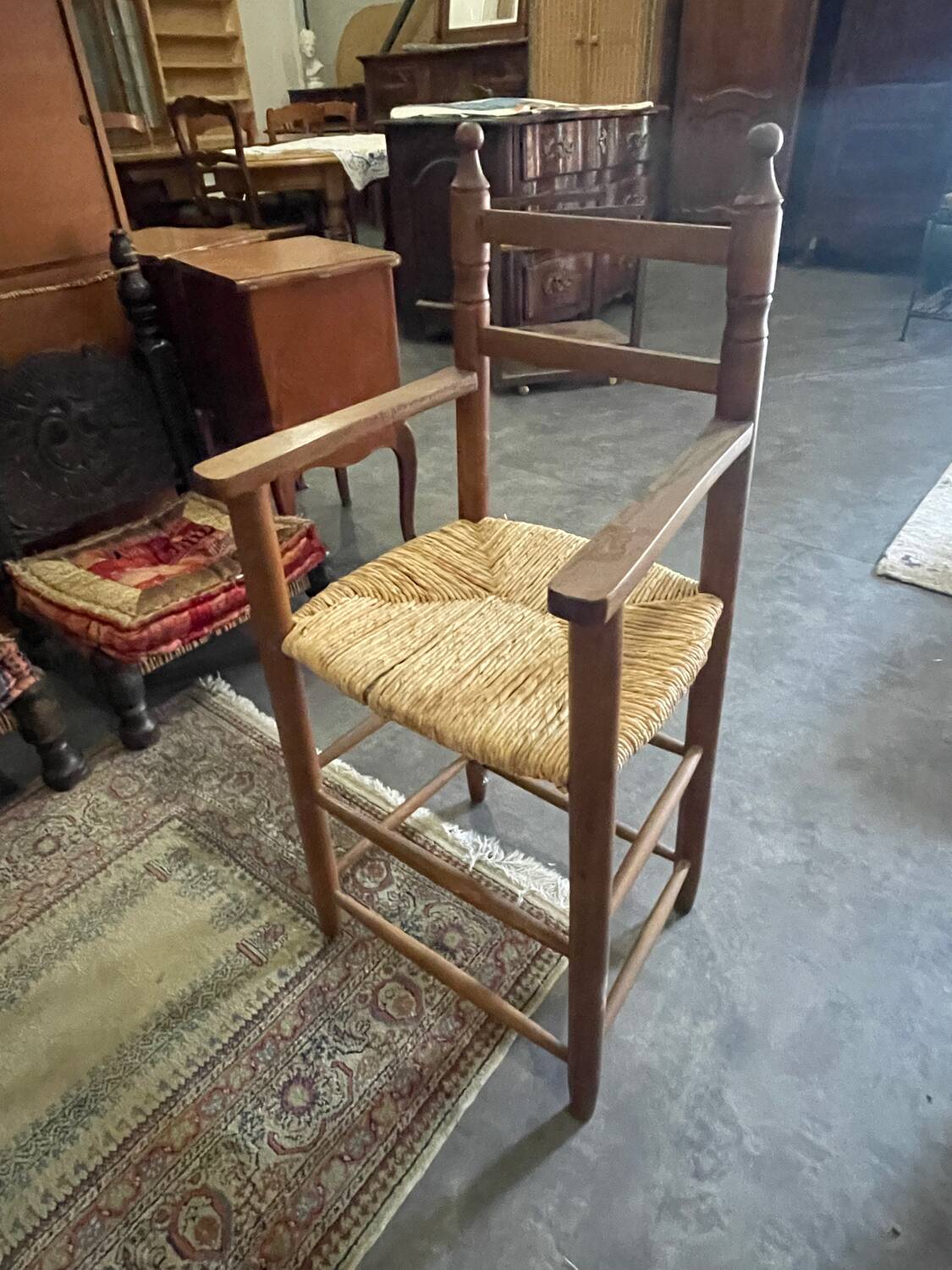 Wooden and straw high chair for children