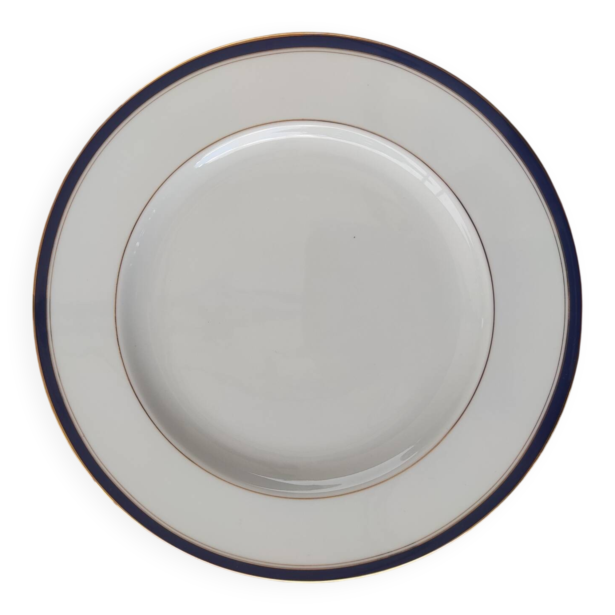 Six blue and gold Limoges porcelain dinner plates
