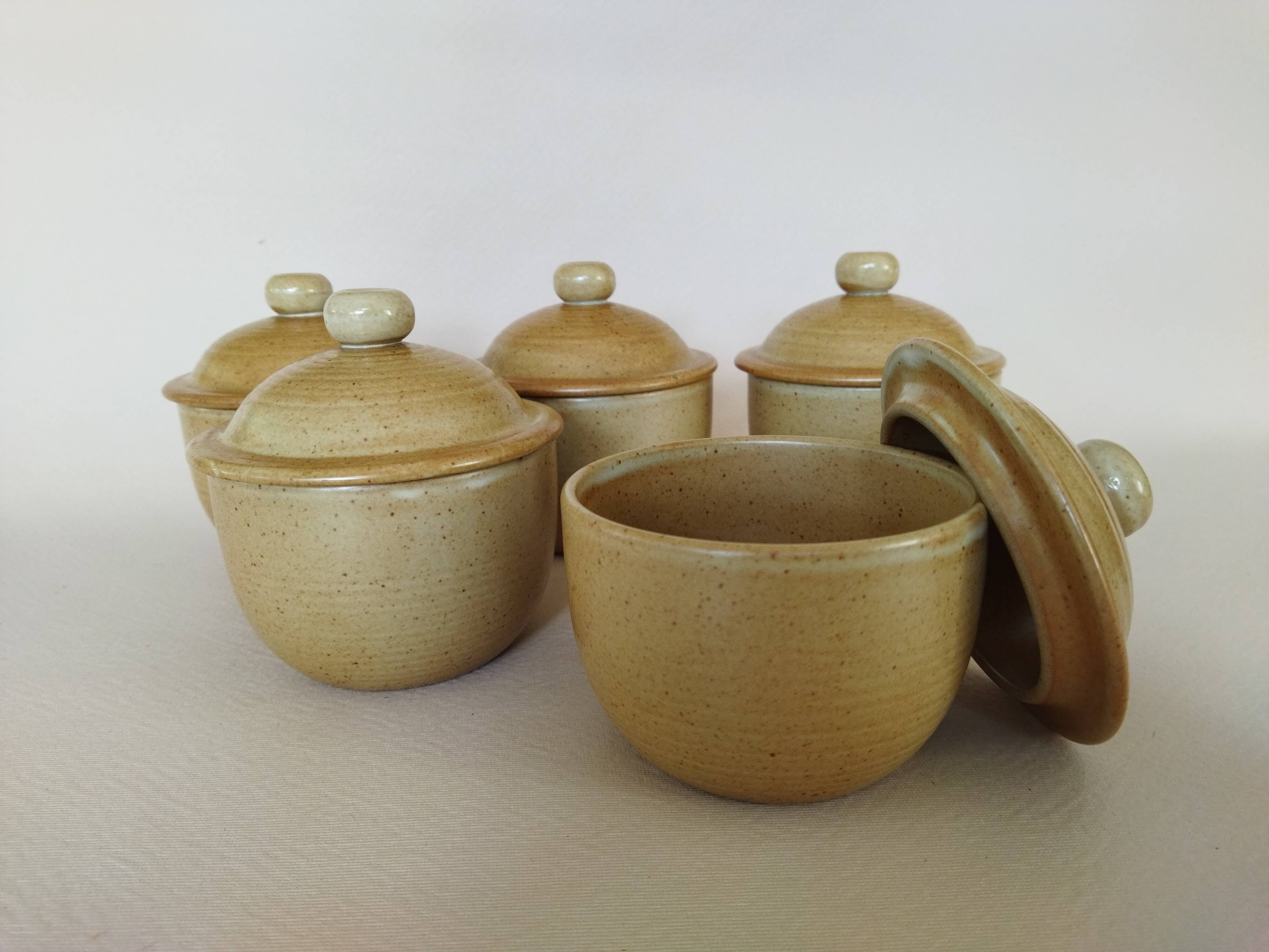 Covered tea bowls in CNP Village sandstone
