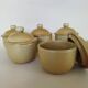 Covered tea bowls in CNP Village sandstone