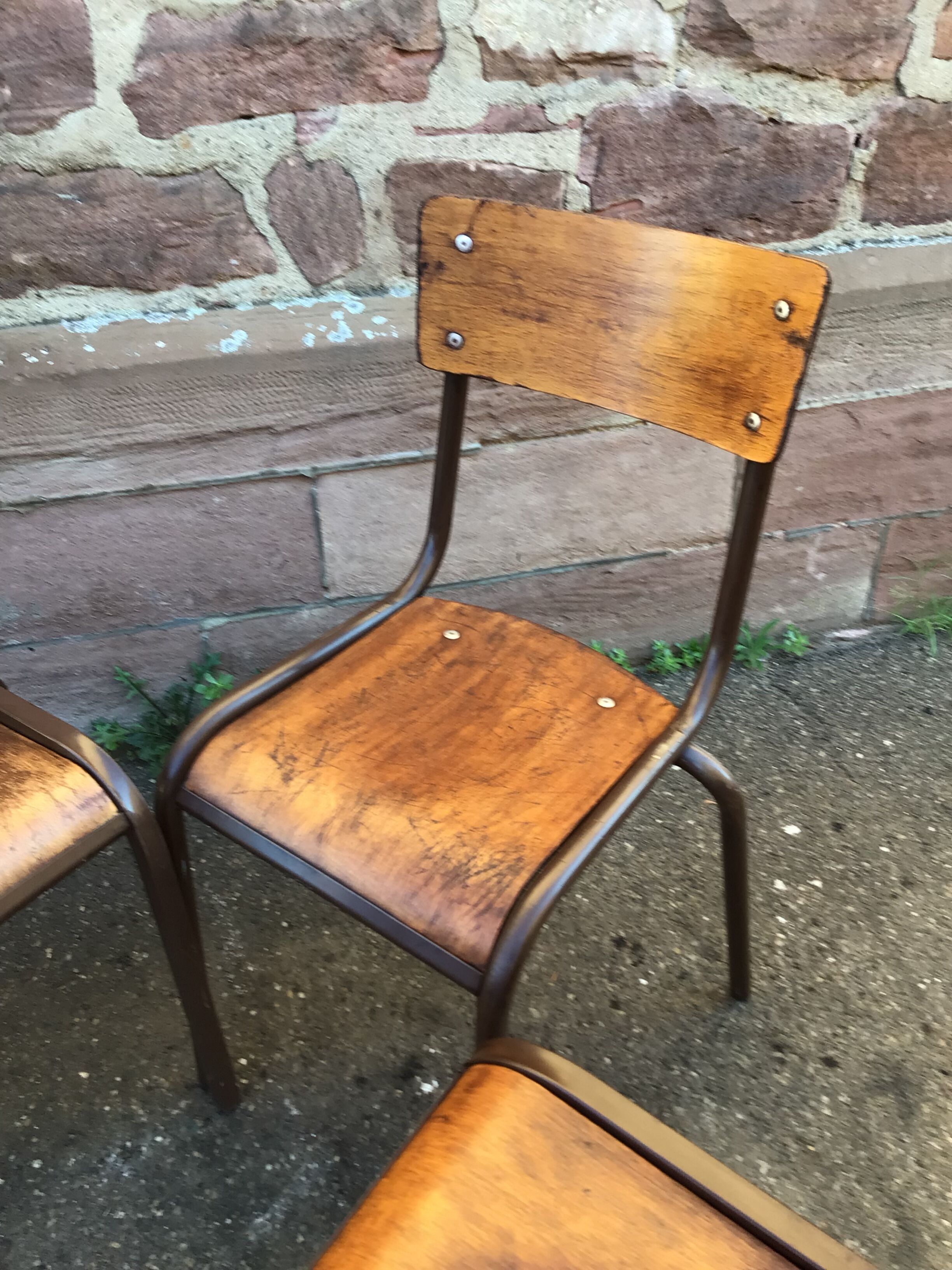 Set of 4 mismatched chairs vintage school mullca communities