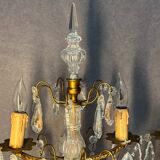 Pair of antique chandeliers, in brass with cut glass pendants, early 20th century