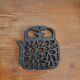 Enamelled cast iron trifle in the shape of a kettle, teapot