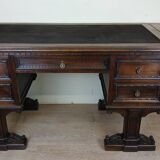 Unusual Renaissance style center desk made in the mid-19th century in walnut