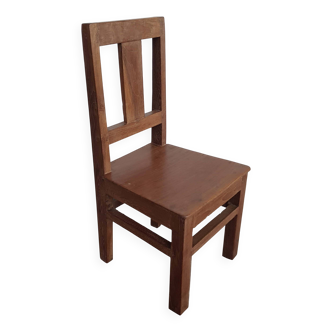 Old children's chair in solid teak