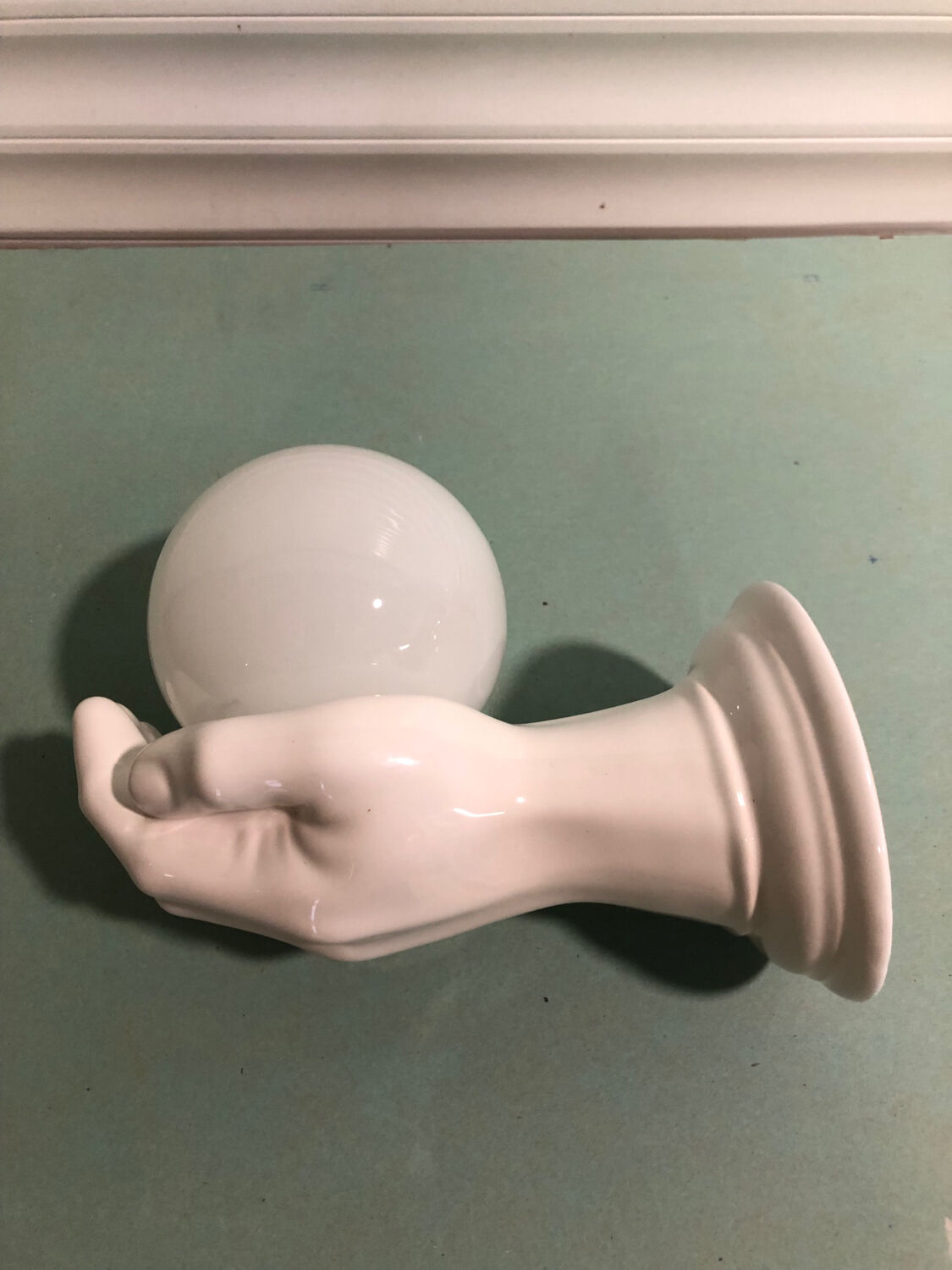 Ceramic hand wall lamp