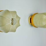 Pair of "cocoon" wall lights, resin and pine, Italy, 1970