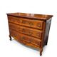 Curved commode in Louis XV style made of cherry wood.