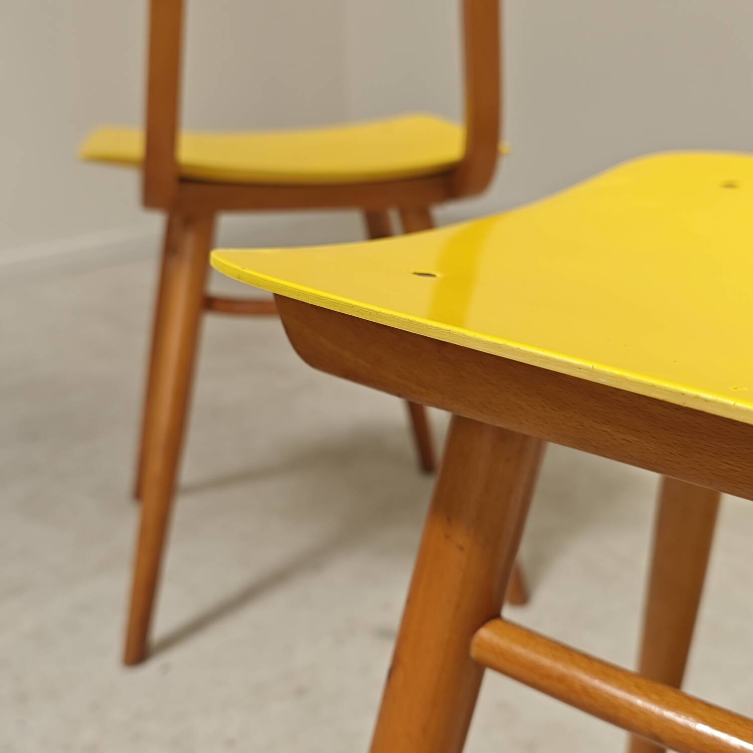 Pair of Ton Bystrice Thonet chairs in wood and yellow molded plastic