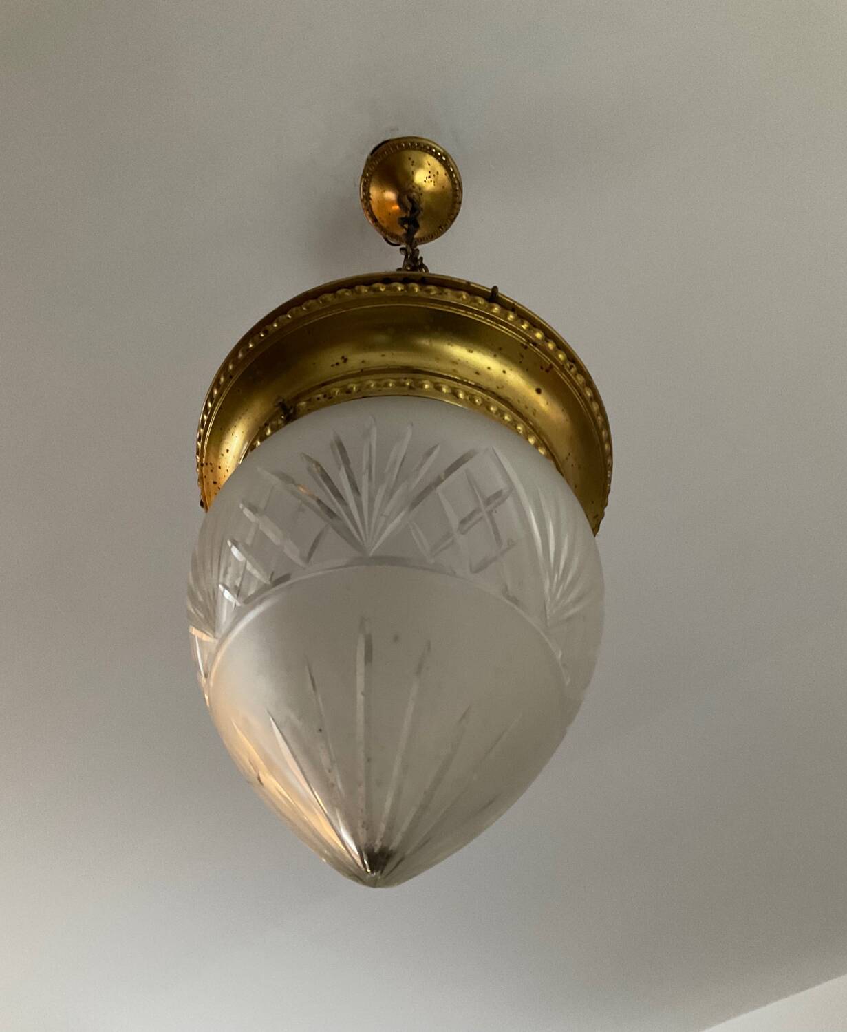 Vintage pendant light in chiseled glass and brass
