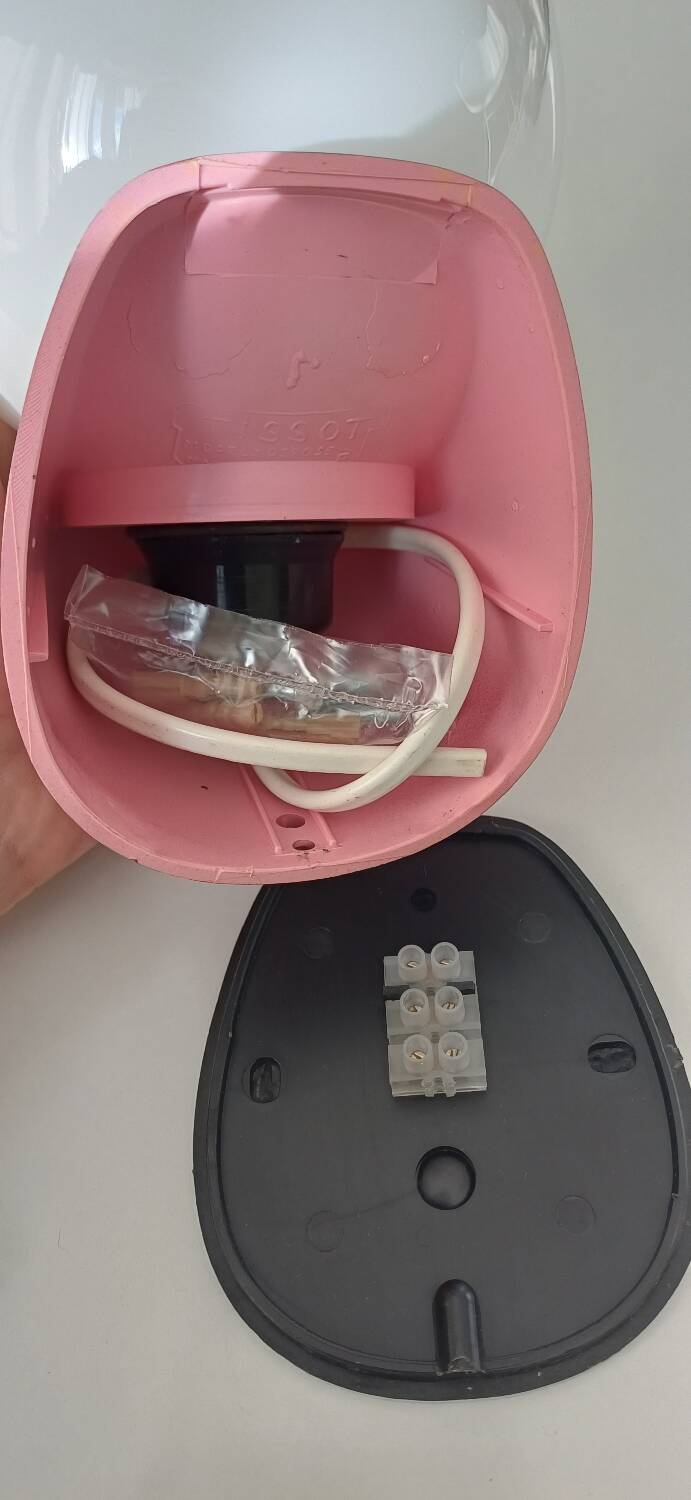 Pair of Tissot wall lights from the 70s with pink opaline glass in space age style.