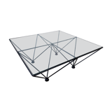 A glass and steel coffee table