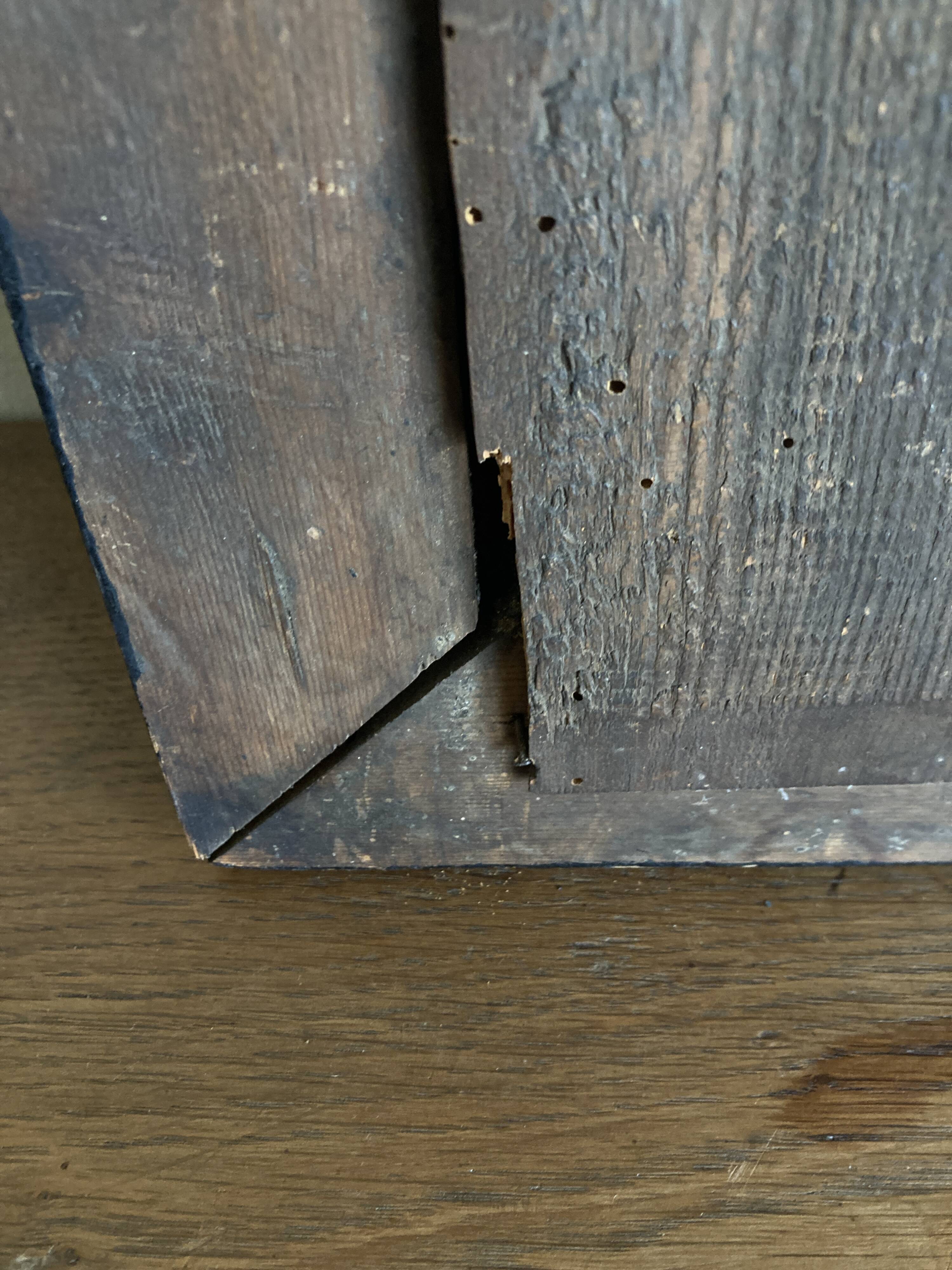 19th century blackened mirror with pitted glass 34cm x 40cm