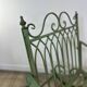 Rocking-chair en fer forgé vert patiné
