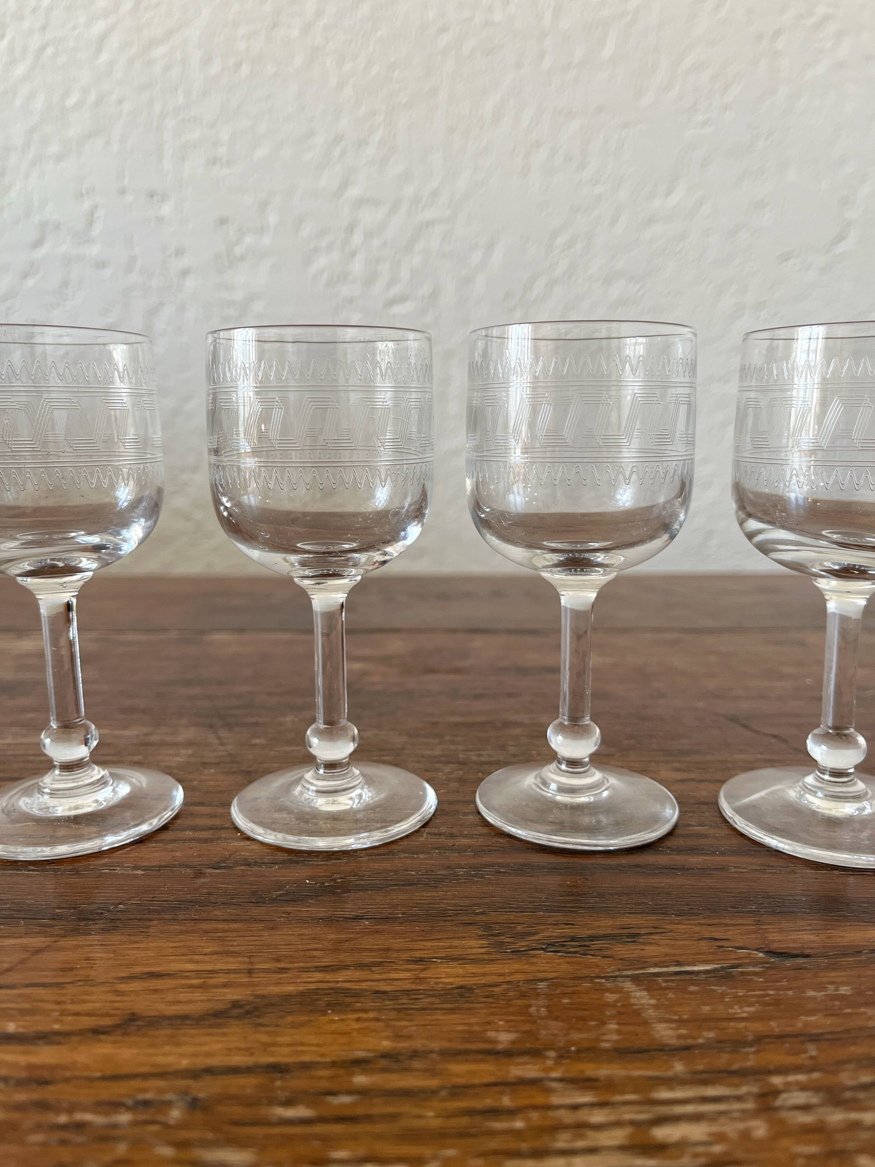Four antique stemmed liqueur glasses in engraved crystal, 19th century