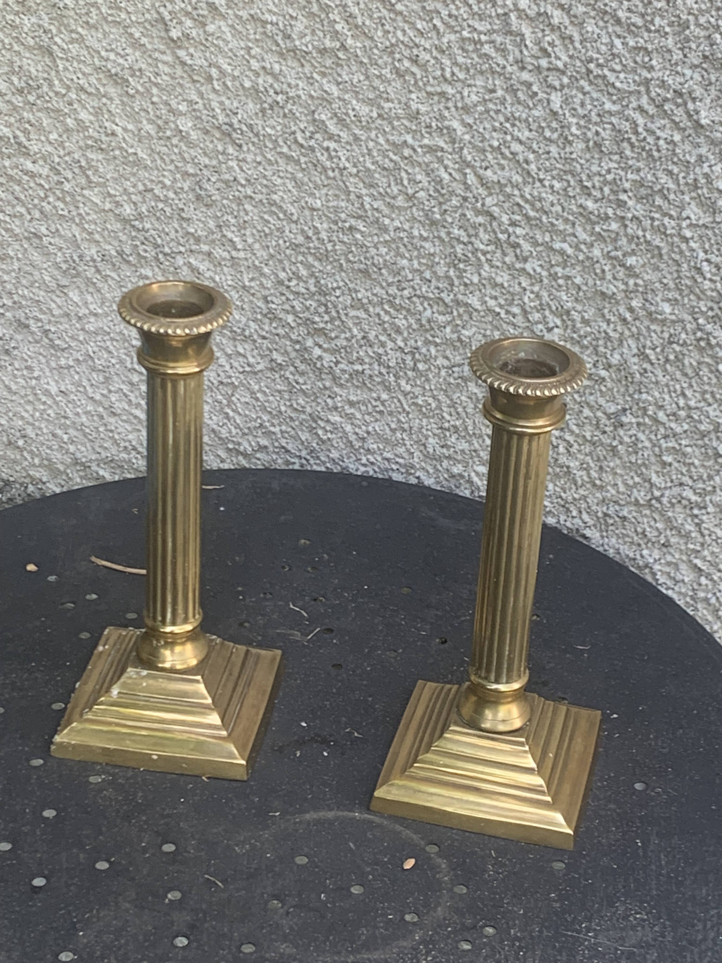 Pair of gilded brass candlesticks, vintage column shape