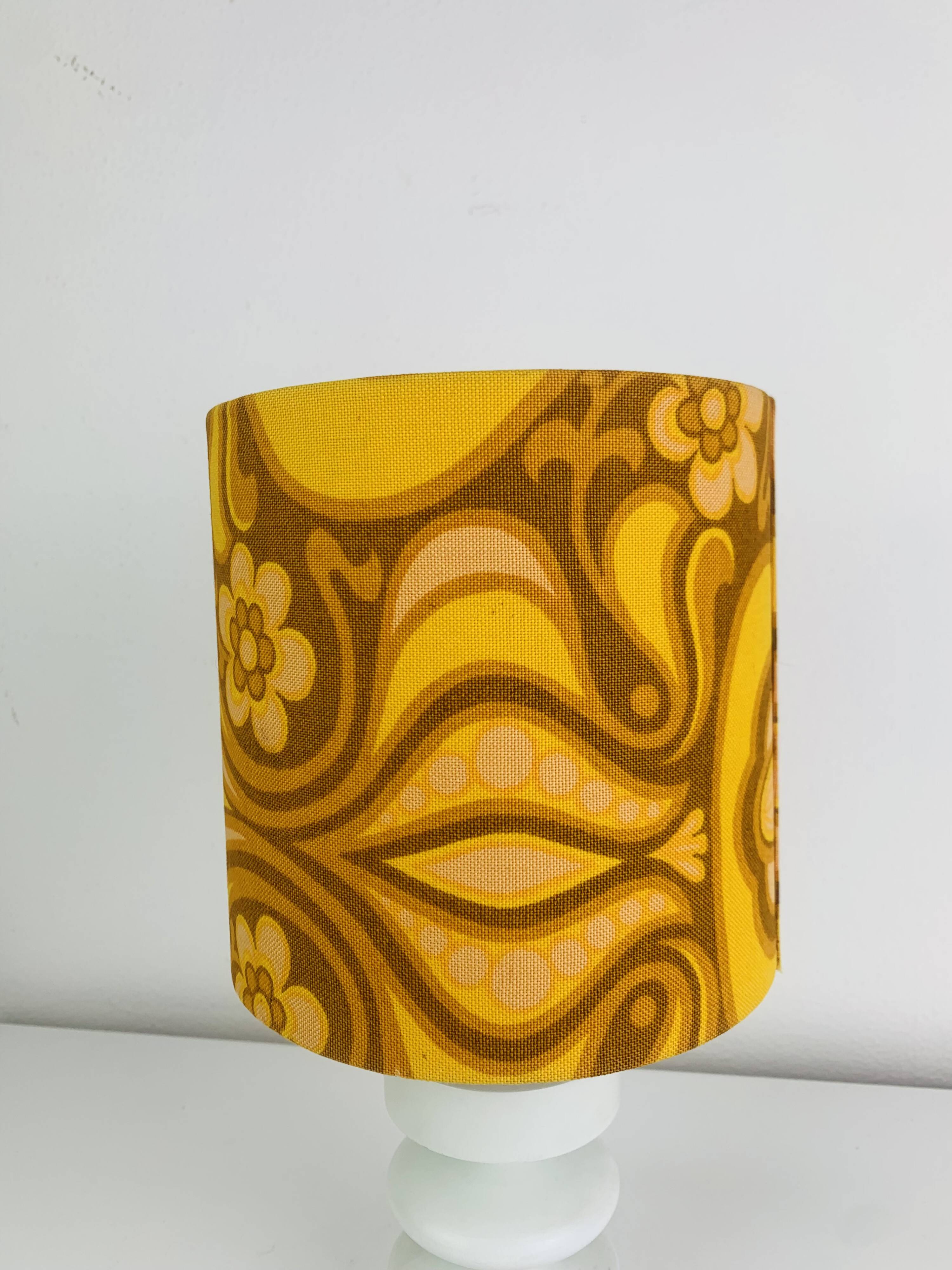 Temde lamp with turned wood and a seventies lampshade.
