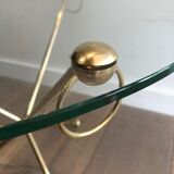 Round coffee table of neoclassical style in brass