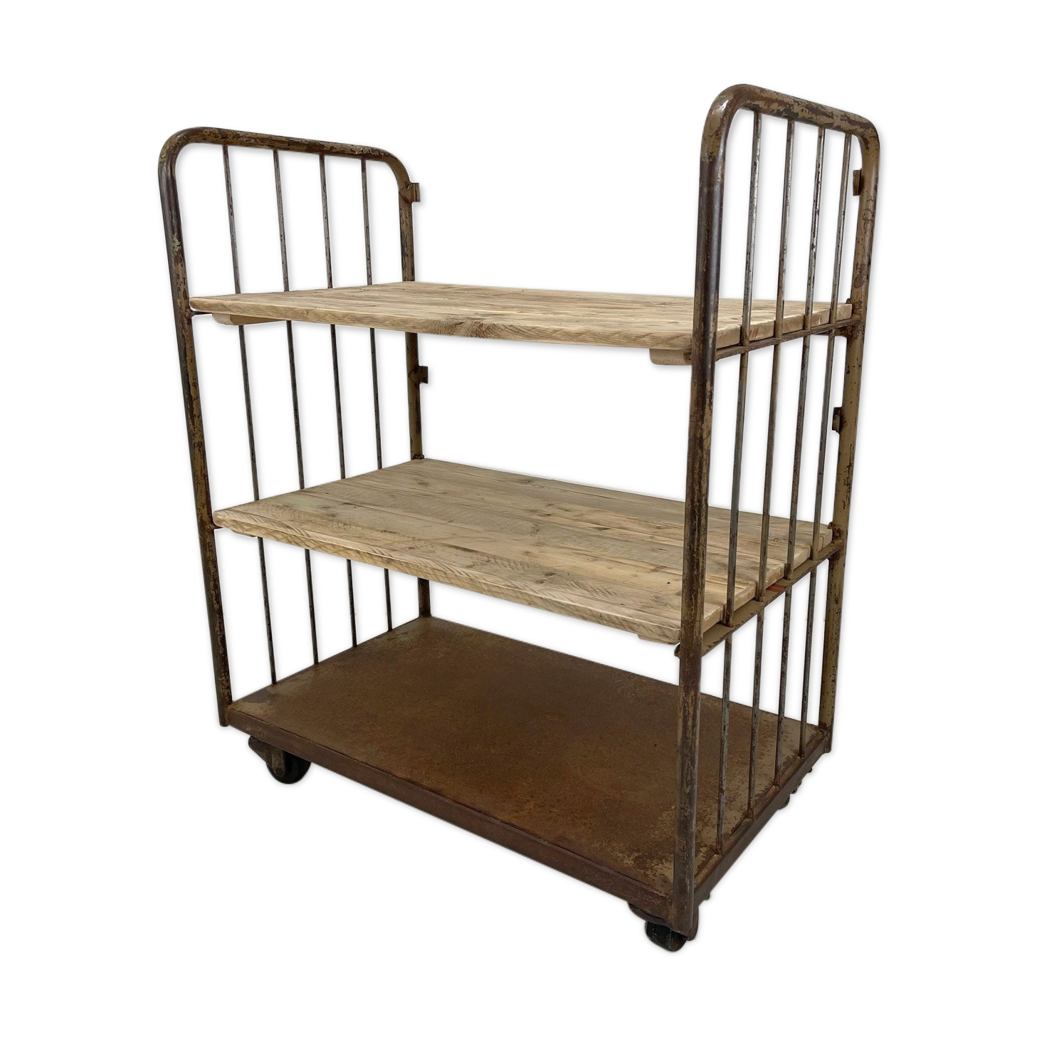 Vintage industrial iron and wood shelves on wheels