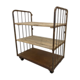 Vintage industrial iron and wood shelves on wheels