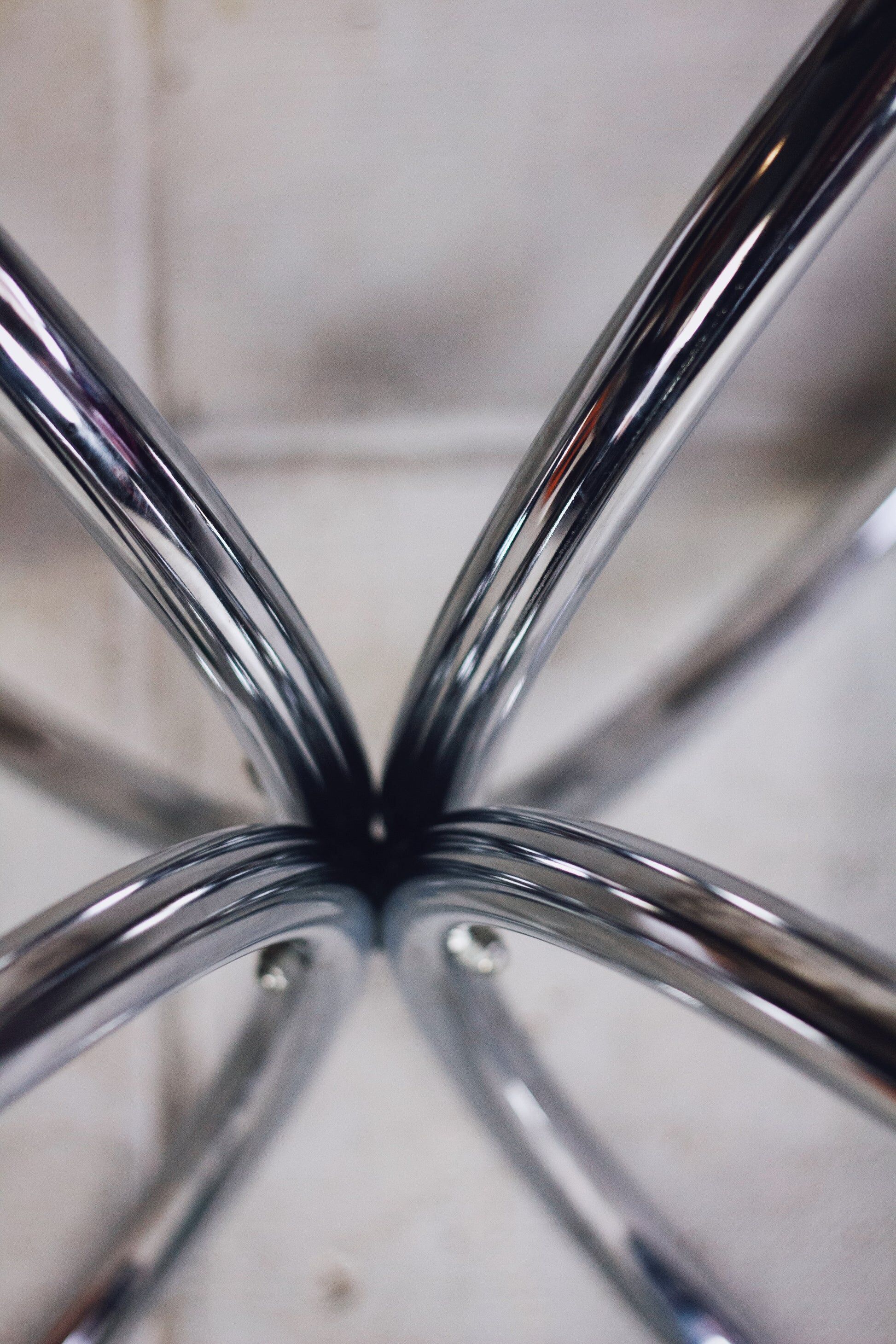 Oval dining table in chrome and smoked glass, 1970.