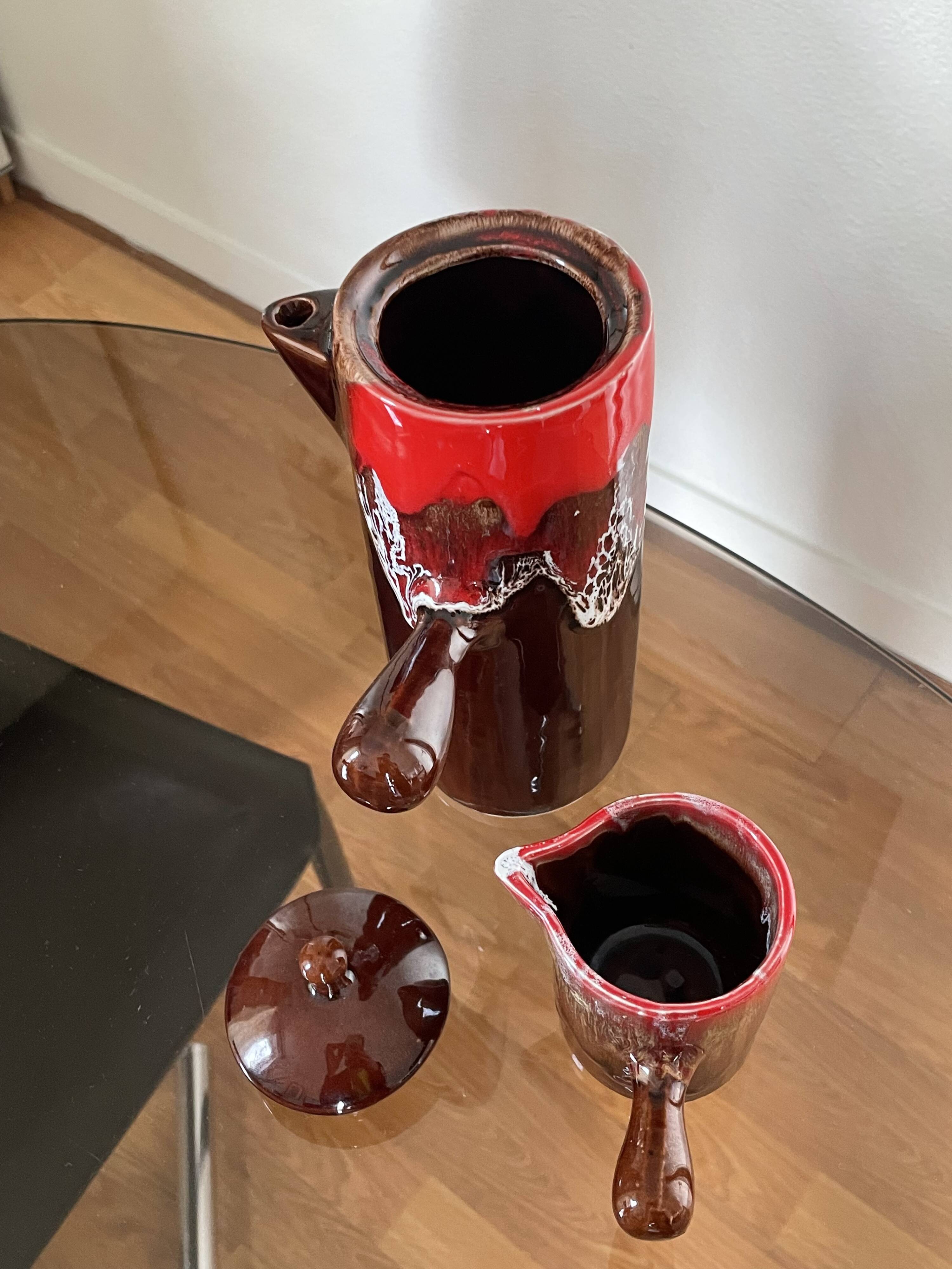 Ceramic teapot and milk jug