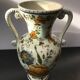 Ancient Delft vase with white ceramics decor vintage flowers