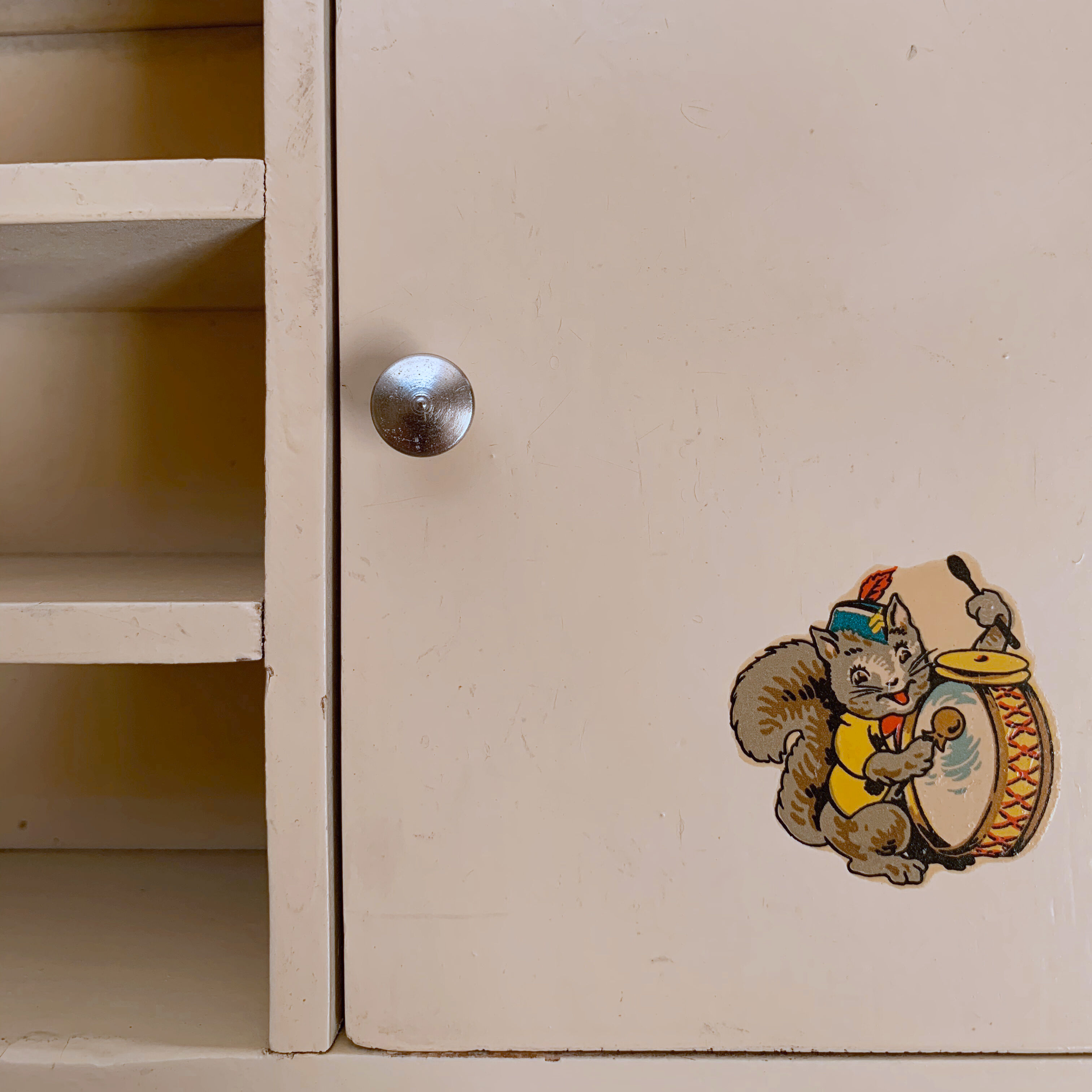 Old doll row wardrobe