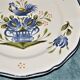 Plate decorated with a rooster earthenware from Lunéville
