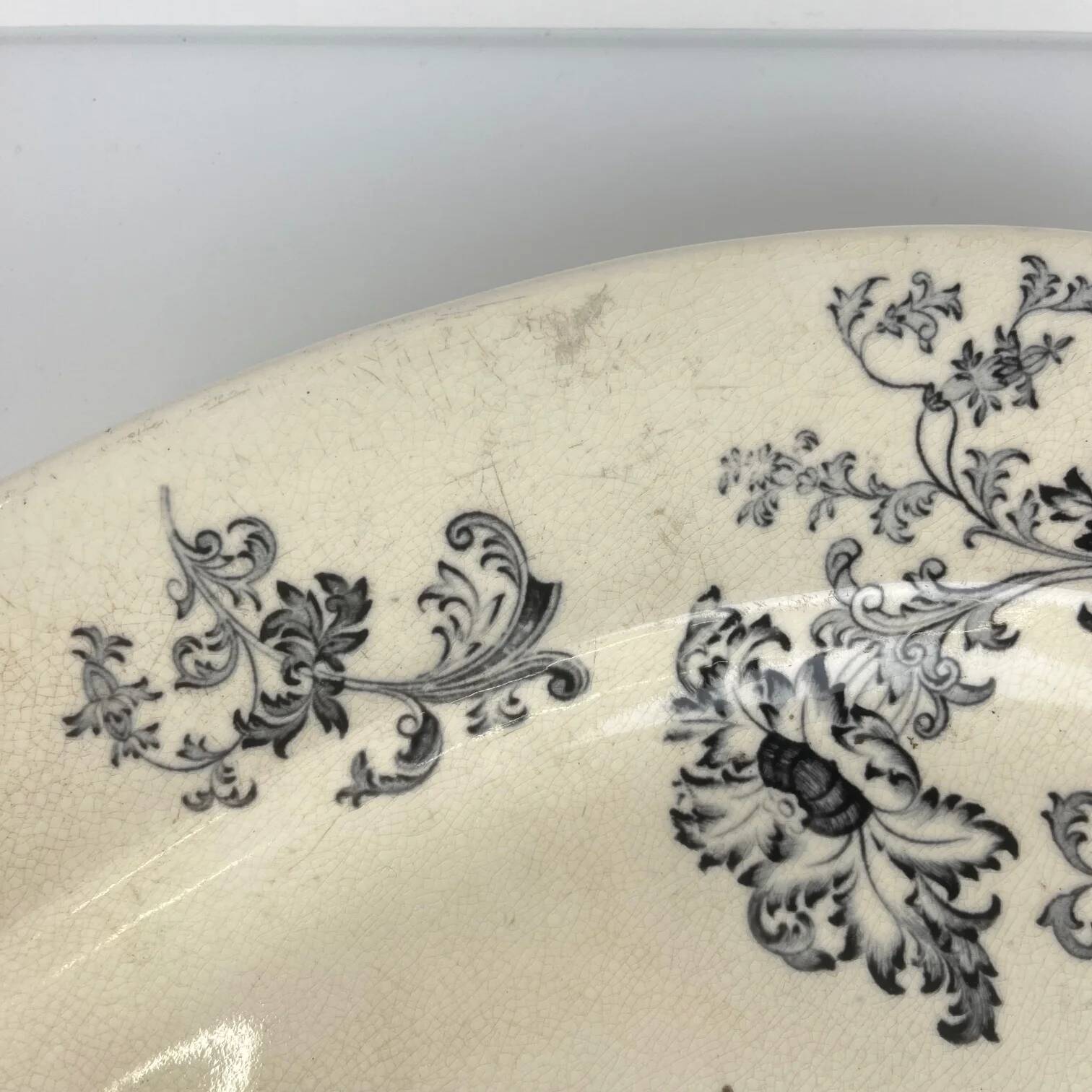 Large oval ironstone dish, "Damas" pattern by Sarreguemines, late 19th century, grey-black.