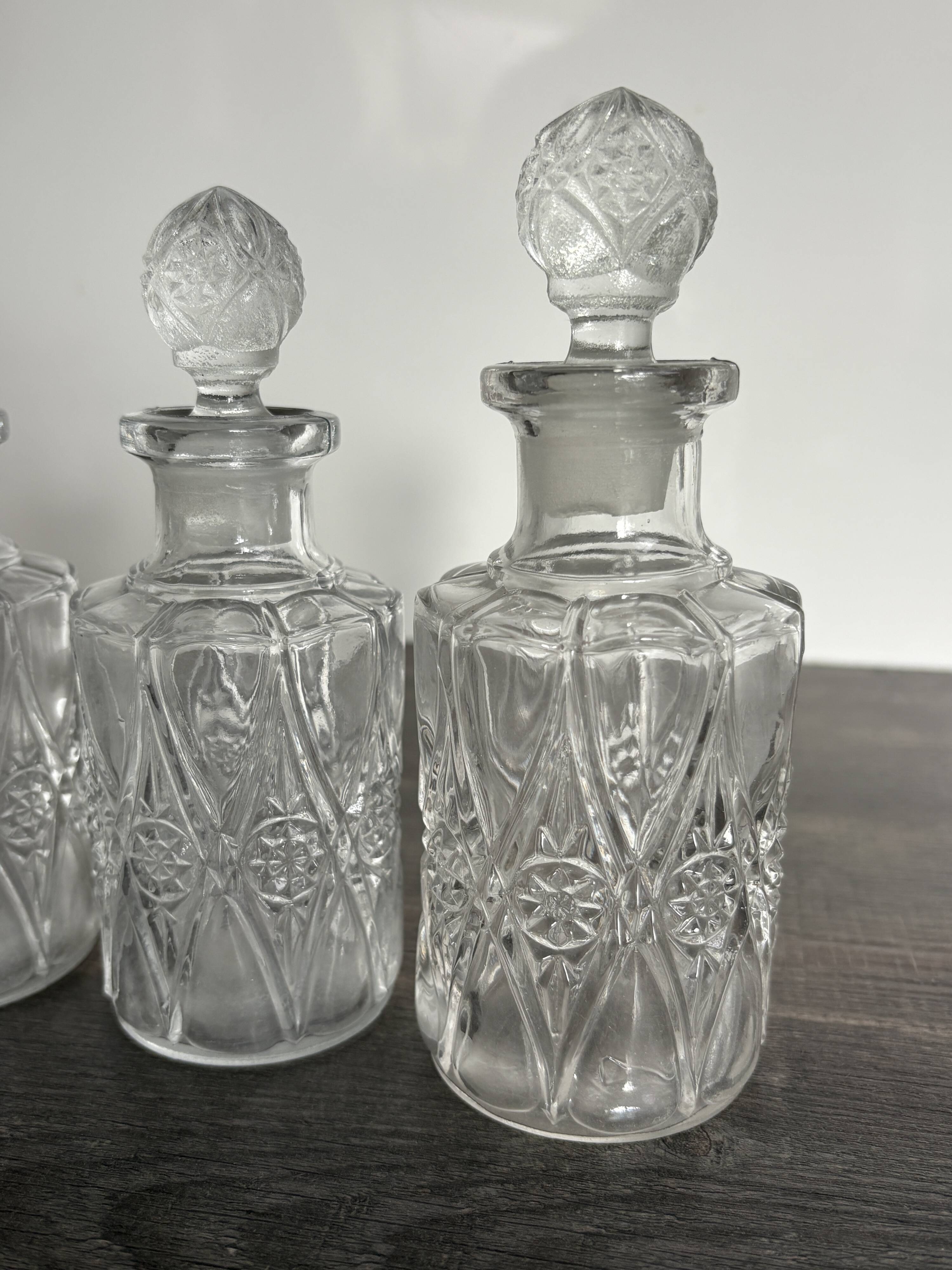 Set of 4 molded crystal bottles – Val Saint Lambert