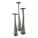 Trio of vintage cast aluminum candlesticks