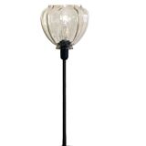 Table lamp with an antique star-shaped globe and a black base