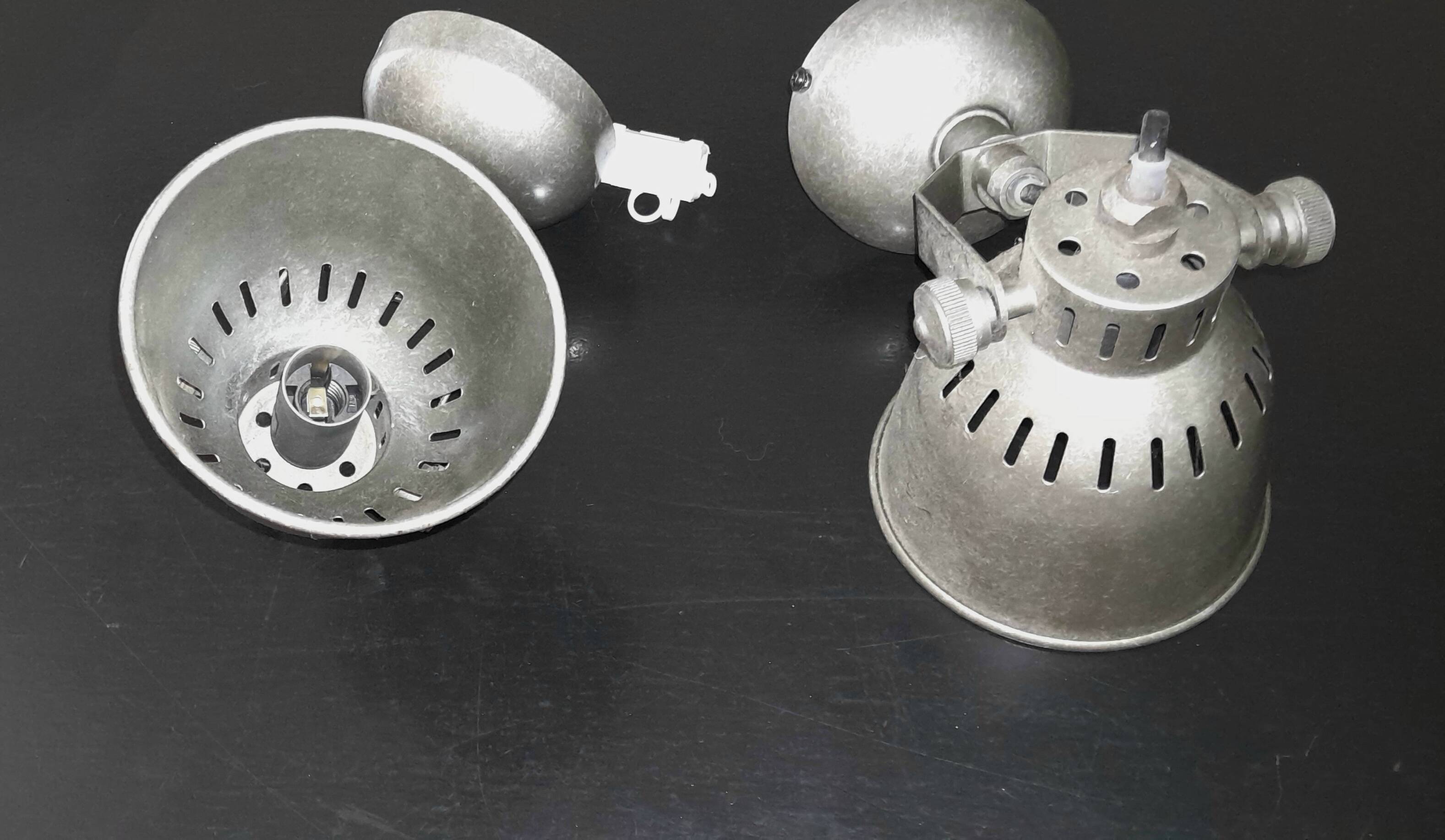 Pair of metal wall sconces