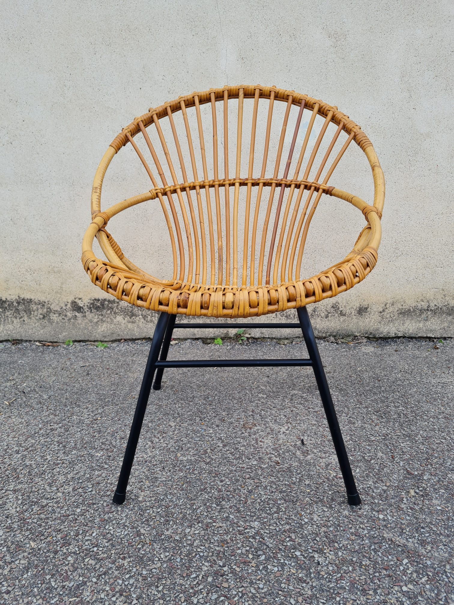 Vintage rattan shell armchair from the 60s