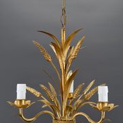 Golden suspension on ears of wheat, circa 1960