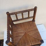 Fauteuil de coin en bois tourné façon chapelet