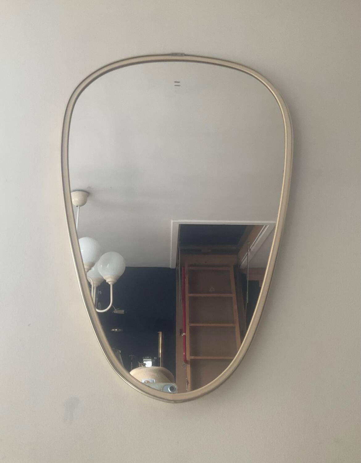 Asymmetrical free-form mirror from the 60s-70s
